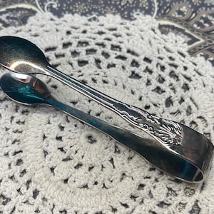 Vintage small silver tone or silver plated sugar cube tongs