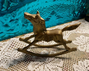 Vintage brass rocking horse - aged
