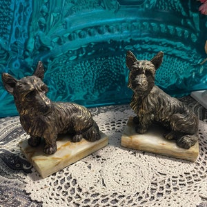 Vintage heavy Cast metal brass and Bronze Tone dog bookends or statues on stone base- facing the same direction