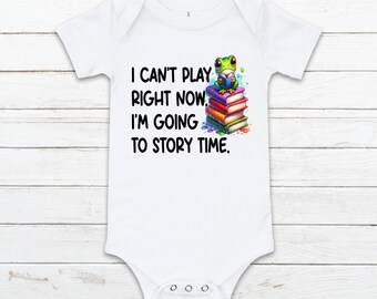 No puedo jugar ahora mismo voy a la hora del cuento rana leyendo un libro bebé romper, linda camiseta para niños, leyendo arco iris