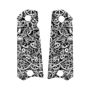 May include: Two vertical pistol grip panels featuring a detailed black and white pattern of interlocking mechanical gears and cogs. Each panel includes two circular mounting holes and the repeating text SCROLLWORKS printed across the surface.