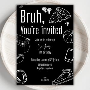 May include: Black invitation card with white illustrations of a pizza slice, basketball, game controller, and headphones. The text reads "Bruh, You're invited" and announces Caiden's 11th birthday on January 17th.