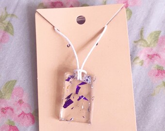 Resin foil cute necklace.