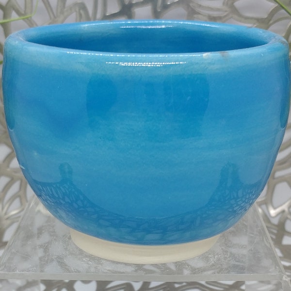 Hand Thrown footed 12 oz White Stoneware tea bowl in blue glacier glaze