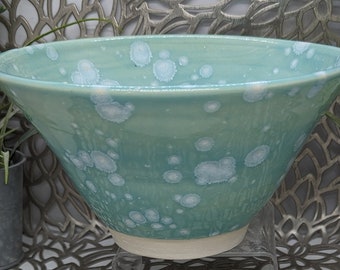 Hand thrown 36 oz footed porcelain ramen bowl in pale green celadon with white color bursts, 7.5x4.5