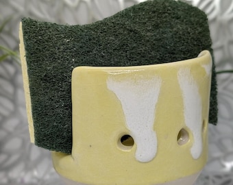 Hand thrown and carved vented porcelain sponge holder in pale yellow and white glaze, 3.5x2.75.