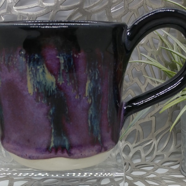 Hand thrown 11 oz straight sided porcelain mug in black, gold, an purple