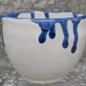 Hand thrown 10 oz traditional footed Chinese style tea bowl in white and blue