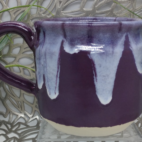 Hand thrown 13 oz straight sided coffee cup in purple and white