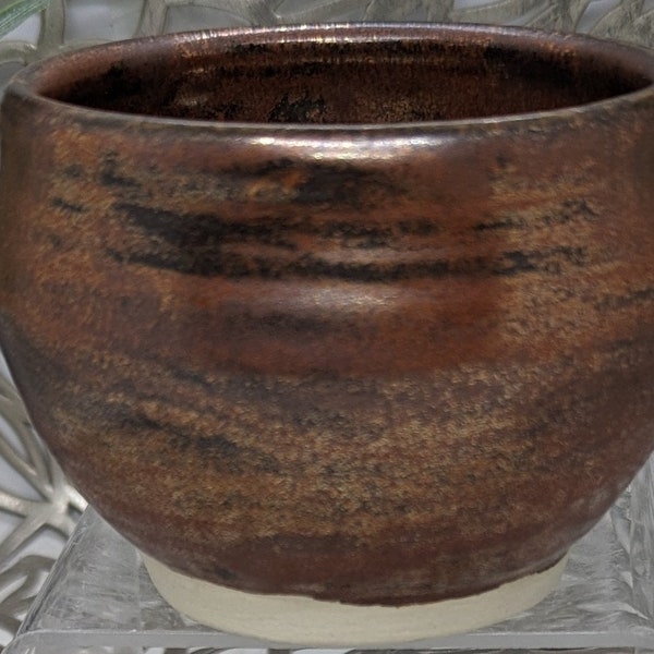 Hand thrown 9 oz footed traditional tea bowl in antique copper glaze