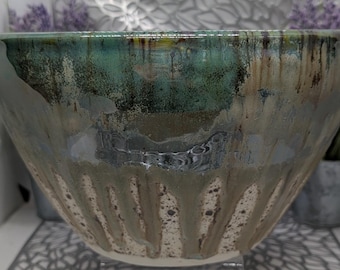 Deeply discounted 10.25 x6.24 hand thrown porcelain bowl in metallic green, brown and brown speckled cream glaze..READ DESCRIPTION!!!