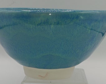 Hand thrown 24 oz footed porcelain bowl in Crribean blue green, 6.25 x 4