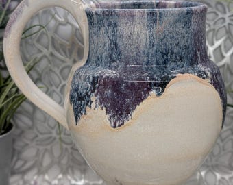 Striking hand thrown huge 30 oz tall porcelain mug in honey cream, dark blue and maroon.