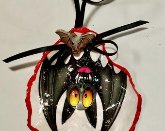 Adorno de concha de ostra de murciélago