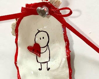 Adorno de concha de ostra con forma de corazón