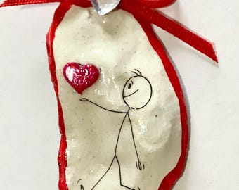 Adorno de concha de ostra de niño con corazón