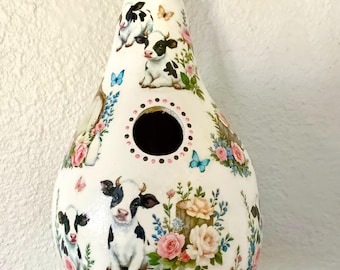 Casa para pájaros con forma de calabaza de vaca de granja