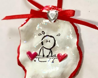 Adorno de concha de ostra de San Valentín con levantador de pesas