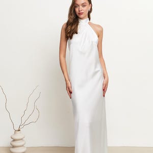 Ivory satin halter maxi wedding dress with open back
