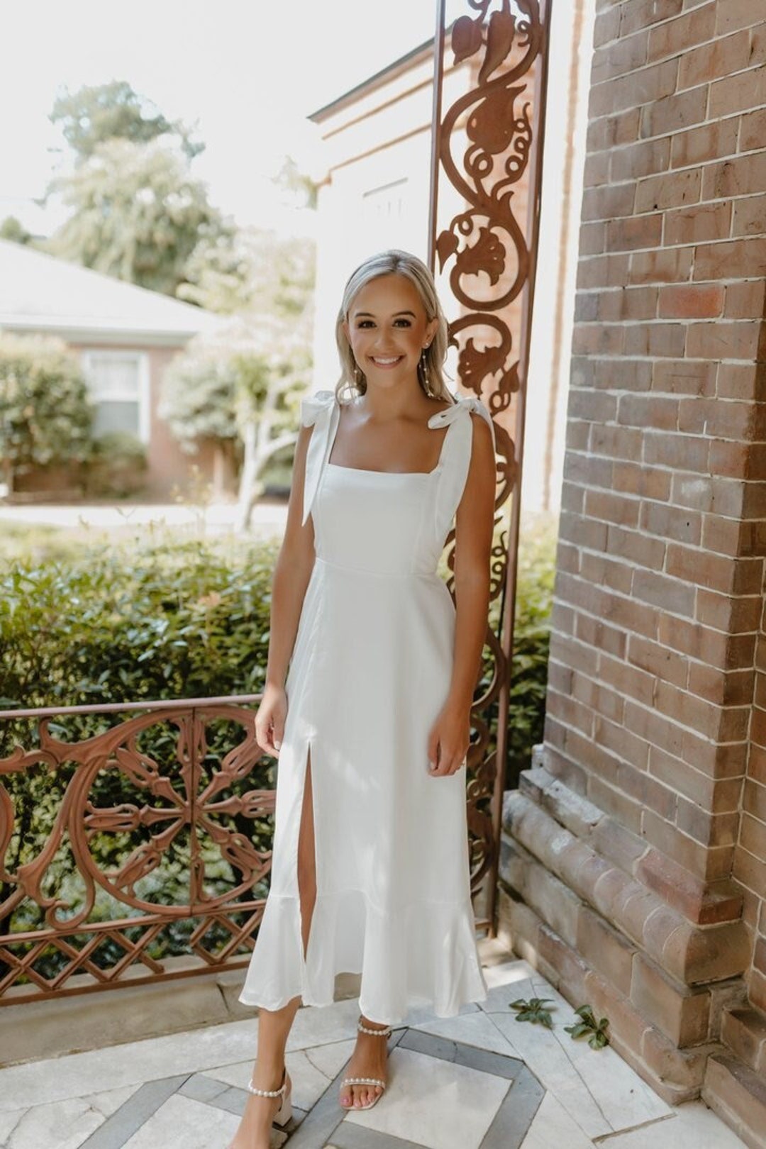white dresses with bows Short Dress Bow Detail The clean lines and striking details ensure youll command attention at any upscale gathering. Love Letters White Sequin Bow