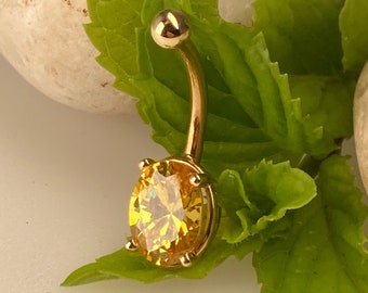 14k gold Yellow Sapphire belly button ring Featuring a gorgeous multi faceted rich yellow sapphire with a 3mm bead top.