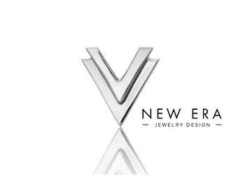 May include: A silver double V-shaped earring. The earring is a geometric design with two overlapping V shapes. The earring is a minimalist style and is perfect for a modern look.