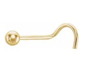 Könnte beinhalten: Ein goldener Nasenring mit einer kleinen Kugel am Ende.