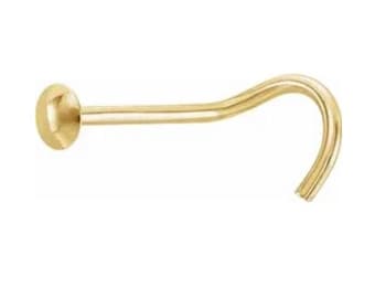 Könnte beinhalten: Ein goldener Nasenring mit einer kleinen Kugel am Ende. Der Ring ist gebogen und hat einen Haken am Ende.
