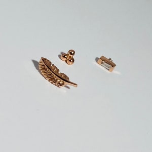 14 karat gold feather, Three bead and  tapered Baguette Body jewelry cartilage helix daith conch lobe and Tragus piercing