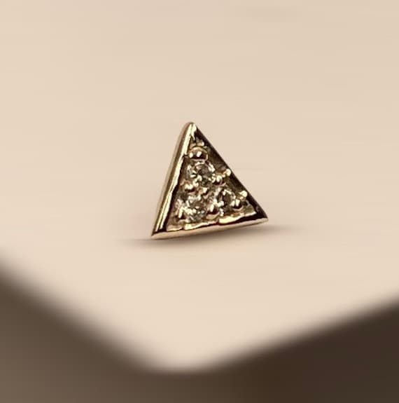 14 karat solid gold Dermal Implant 4mm Triangle. Featuring three CZ stone.
