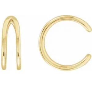 May include: A pair of gold ear cuffs. The ear cuff on the left is a double loop design, while the ear cuff on the right is a single loop design.