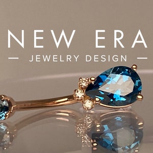 14 karat solid gold London blue topaz & diamond belly button ring! London blue Gemstone and diamond Navel ring.