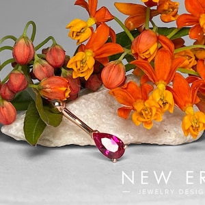 14 karat gold Ruby belly button ring. Pear-shaped navel ring. Ruby body jewelry curved barbell.