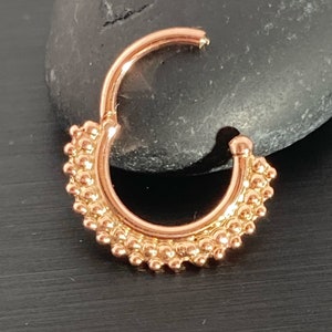 14 karat solid rose gold double beaded Hinged/Clicker septum ring featured in 16 gauge and 3/8 inch ring. Customizable