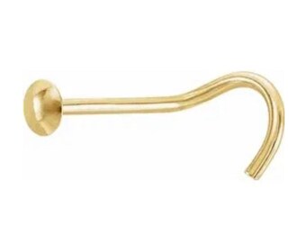 Könnte beinhalten: Ein goldener Nasenring mit einer kleinen runden Kugel am Ende und einem gebogenen Haken.