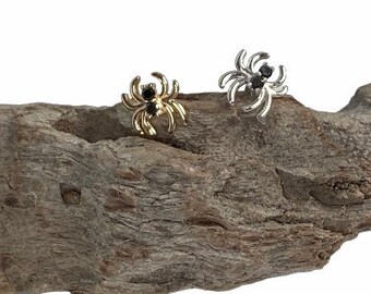 14k gold Black Diamond Spiders. Sold individually. 14g or 16g threads. Individual earring flat back, ball back, friction or push pin