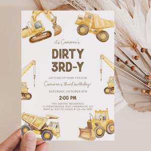 May include: A birthday invitation featuring watercolor illustrations of construction vehicles, including a dump truck, excavator, and crane. The invitation reads "DIRTY 3RD-Y" and includes event details such as the date, time, and location.