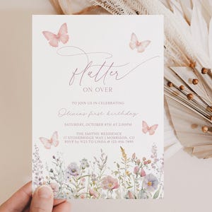May include: A light-colored invitation with the text "Flutter On Over" and "Olivia's first birthday". The invitation features watercolor butterflies and floral illustrations. The date is Saturday, October 8th at 2:00 PM.