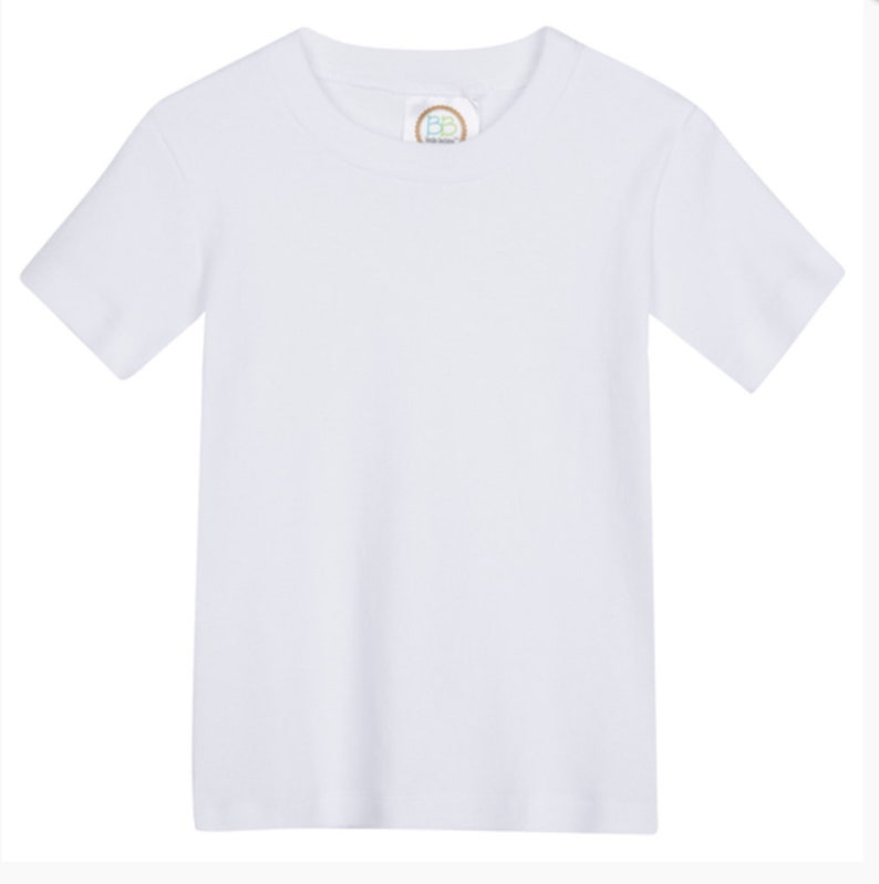 May include: A plain white short-sleeved t-shirt for kids. The shirt has a small, round label with the letters "BB" in a colorful design.