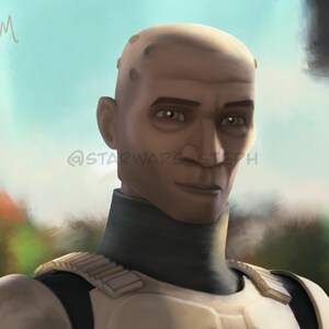 May include: A close-up portrait of a man with a shaved head and a light brown complexion. He is wearing a dark grey turtleneck and a white and grey uniform. The background is blurred and out of focus.