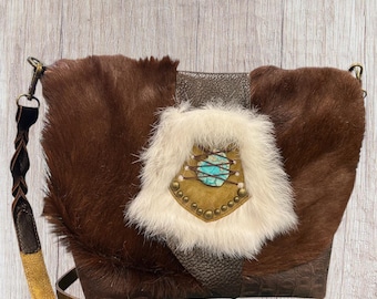 Unique artisan leather crossbody shoulder bag with hair on hide and turquoise stone