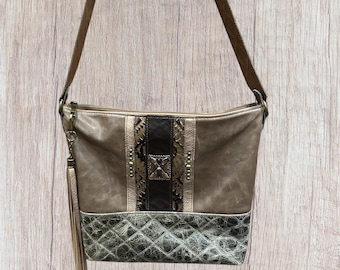 Western or boho  flair shoulder bag, leather with metallic accents , Rodeo chic