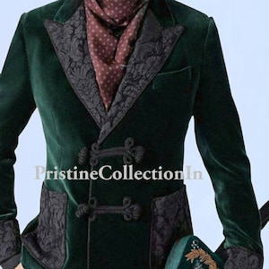 May include: A dark green velvet blazer with black trim and decorative buttons. The blazer has a shawl collar and a pocket on the left side. The blazer is worn over a plaid shirt and a patterned scarf.