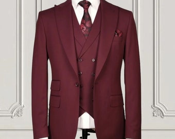 May include: A burgundy three-piece suit with a double-breasted jacket and a vest. The suit is made of a smooth, wrinkle-resistant fabric.