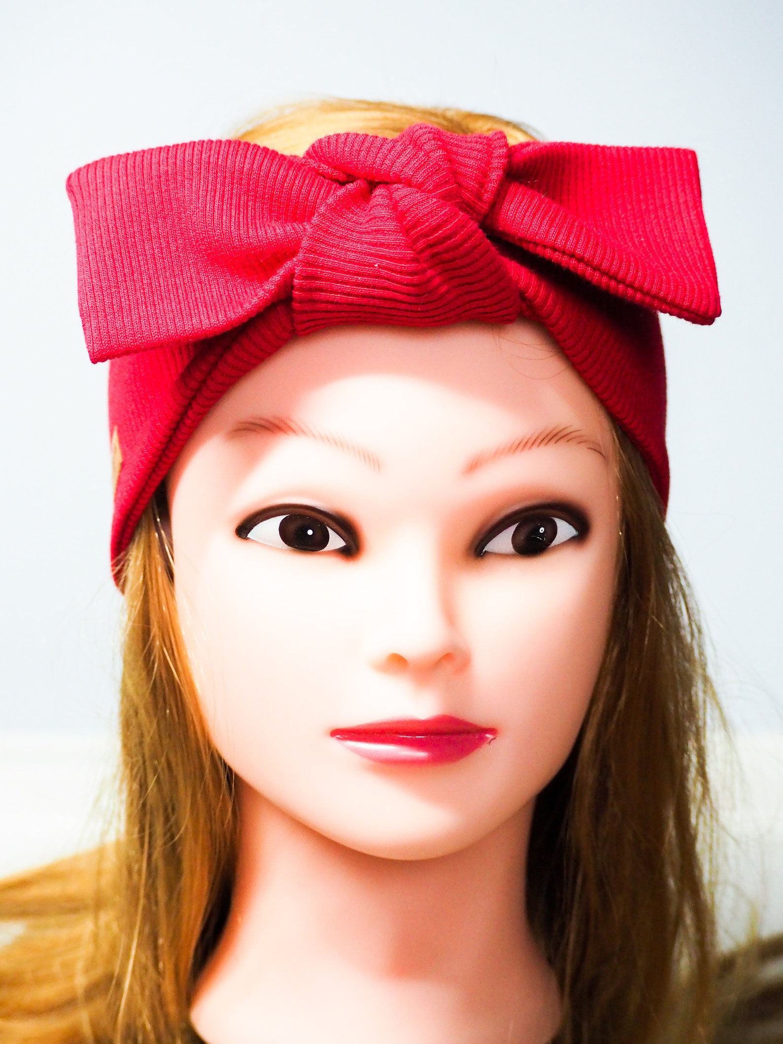 woman with red headband