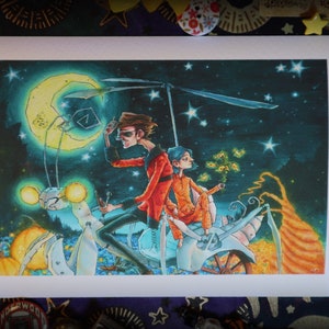 May include: A whimsical illustration of two figures riding a mechanical insect against a starry night sky. The insect has glowing eyes and a crescent moon in the background. The figures are dressed in red and orange clothing.