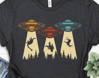 Camisa ovni, camisa alienígena, camisa bigfoot, camisa espacial, camisa de dinosaurio, camiseta alienígena, camisa críptica, camisa de aventura, camisas que van duro