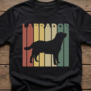 Black shirt featuring a retro design with a labrador silhouette and the text "LABRADOR" on top.