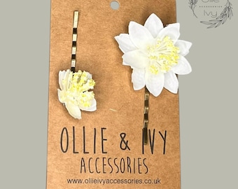 Juego de pinzas para el cabello con forma de estrella y flor, color blanco (x2)