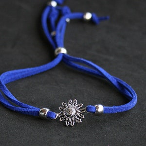 Pulsera Eguzkilore azulón